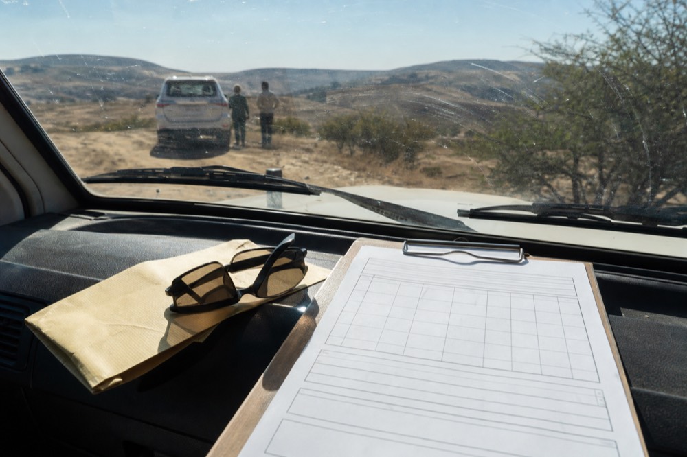 Mexican immigration form FMM on a clipboard, no text, no logos, no people