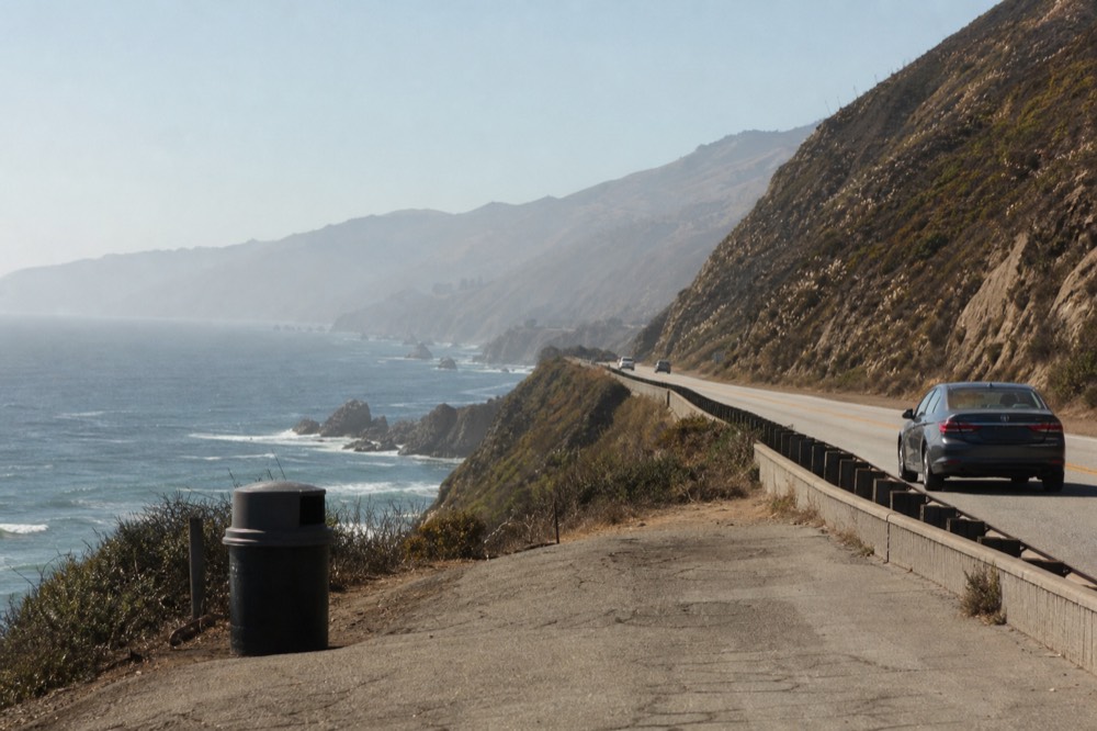 A coastal highway curving along cliffs above the Pacific in northern Baja California, no text, no logos, no people
